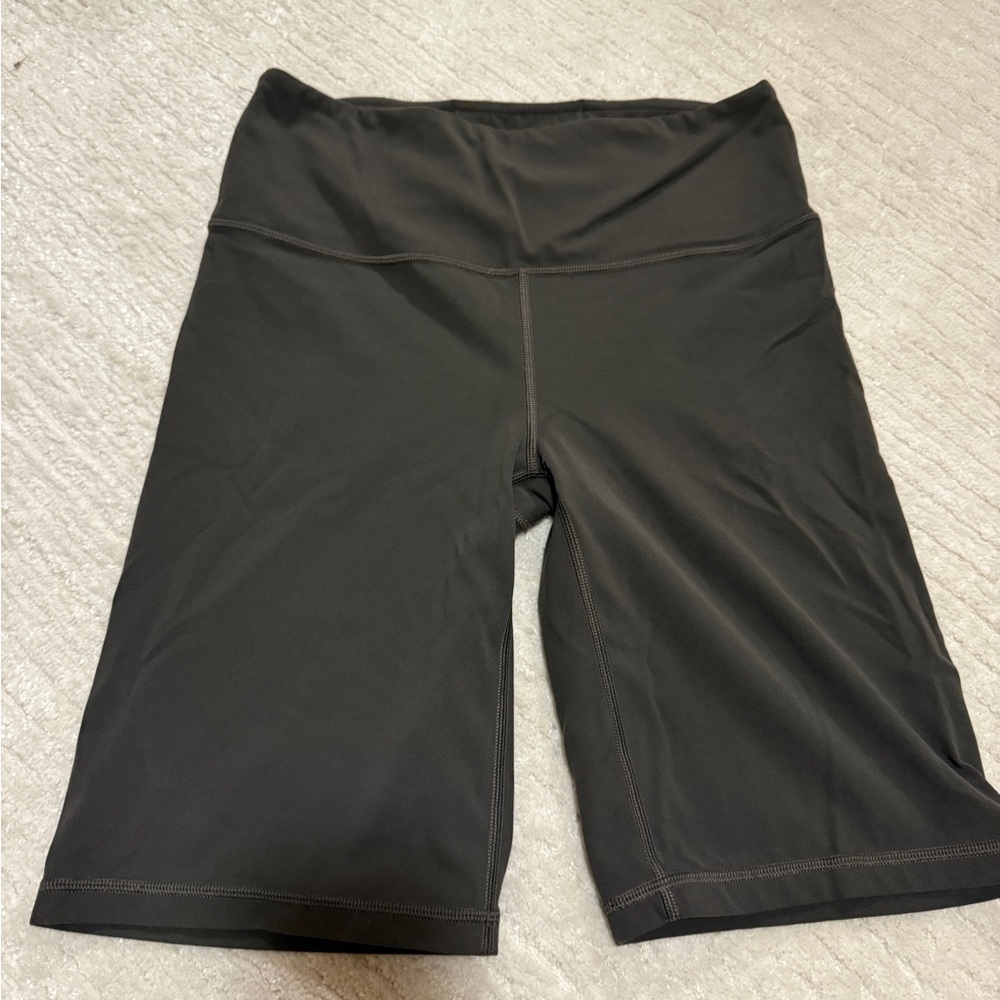 Athleta Green Bike Shorts with Snug Fit and Wide Waistband
